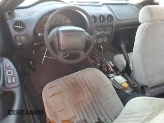 2000 Pontiac Firebird Firebird z VIN 2G2FS22K7Y2145503, wystawiony jako Copart lot #80487434 z przebiegiem 120 386 mil mil oraz Czysty tytuł • Clean title. Historia ofert i sprzedaży dostępna na DreamBid. Obrazek 8.