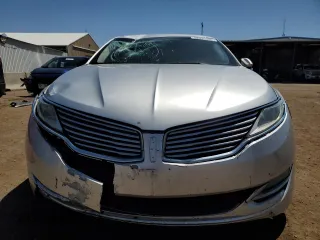 2013 Lincoln MKZ z VIN 3LN6L2GK6DR827247, wystawiony jako Copart lot #58029095 z przebiegiem 159 174 mil mil oraz Szkoda całkowita • Salvage title. Historia ofert i sprzedaży dostępna na DreamBid. Obrazek 5.