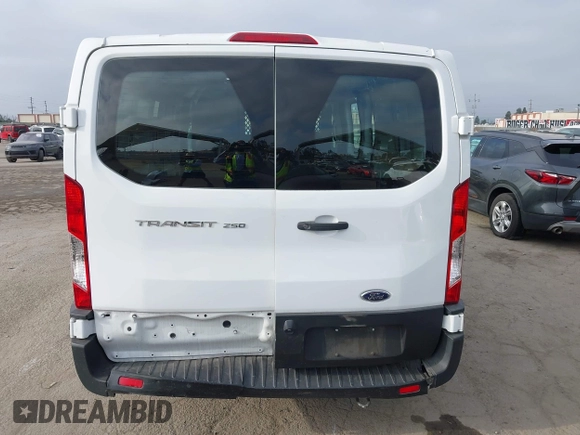 2021 Ford Transit Cargo with VIN 1FTBR1Y85MKA69355, listed as a IAAI auction lot 42544780 with 33,288 mi miles and . Bid and sale history available at DreamBid. Image 16.