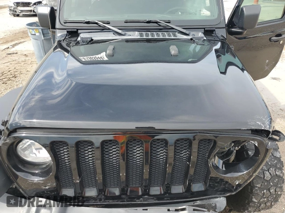 2021 Jeep Wrangler Unlimited Willys Sport with VIN 1C4HJXDN3MW681126, listed as a Copart auction lot 61303544 with 39,514 mi miles and Salvage title. Bid and sale history available at DreamBid. Image 13.