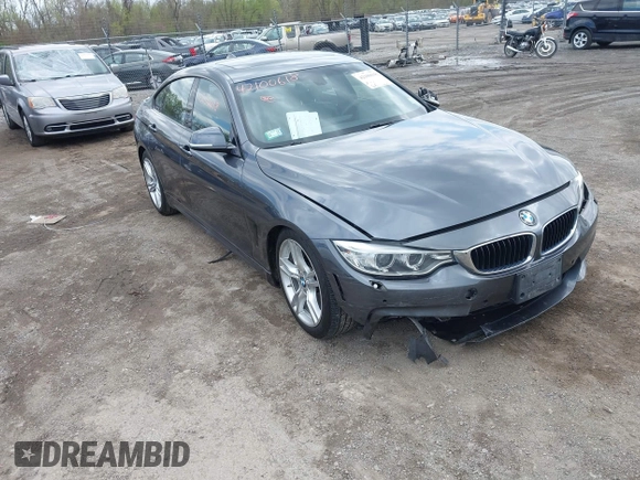2015 BMW 4 Series 428i xDrive z VIN WBA4A7C5XFD415131, wystawiony jako IAAI lot #42100618 z przebiegiem 89 093 mil mil oraz . Historia ofert i sprzedaży dostępna na DreamBid. Obrazek 1.