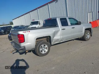 2014 Chevrolet Silverado 1500 LT with VIN 1GCVKREC0EZ162611, listed as a IAAI auction lot 41637456 with 162,637 mi miles and . Bid and sale history available at DreamBid. Image 4.