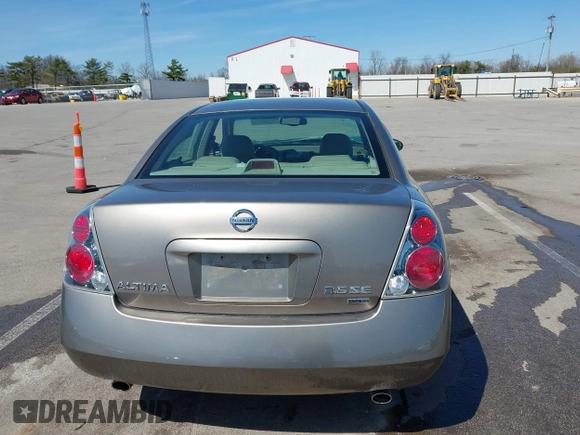 2005 Nissan Altima SE z VIN 1N4BL11D65C148642, wystawiony jako IAAI lot #42056330 z przebiegiem 81 328 mil mil oraz . Historia ofert i sprzedaży dostępna na DreamBid. Obrazek 16.