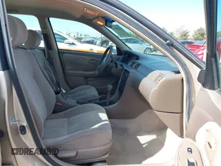 2000 Toyota Camry LE z VIN JT2BF22K5Y0258522, wystawiony jako IAAI lot #41998874 z przebiegiem 300 186 mil mil oraz . Historia ofert i sprzedaży dostępna na DreamBid. Obrazek 5.