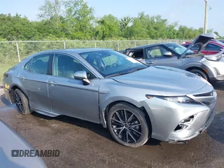 2021 Toyota Camry SE Nightshade with VIN 4T1G11AKXMU599663, listed as a IAAI auction lot 41902392 with 76,909 mi miles. Bid and sale history available at carsss.com. Image 13.