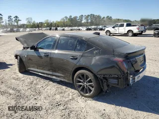 2025 Cadillac CT5 Sport with VIN 1G6DP5RK9S0112073, listed as a Copart auction lot 49506065 with 7,277 mi miles and Salvage title. Bid and sale history available at DreamBid. Image 2.
