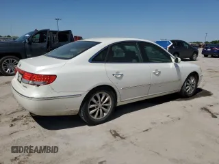 2006 Hyundai Azera SE z VIN KMHFC46F56A098008, wystawiony jako Copart lot #51842105 z przebiegiem 129 476 mil mil oraz Tytuł czysty. Historia ofert i sprzedaży dostępna na DreamBid. Obrazek 3.