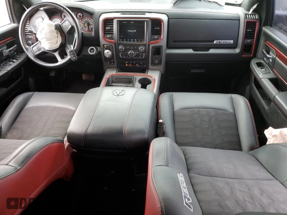 2018 Ram 1500 Rebel with VIN 1C6RR7YT7JS235965, listed as a Copart auction lot 84749674 with 61,484 mi miles and Salvage title. Bid and sale history available at DreamBid. Image 8.