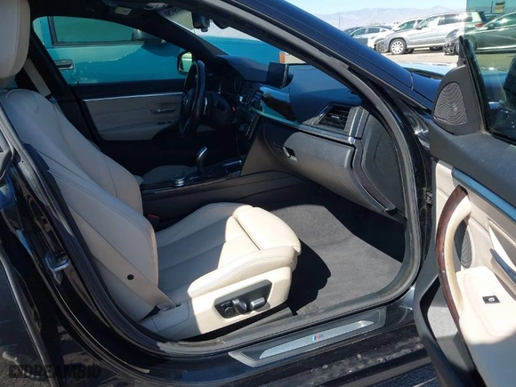 2016 BMW 4 Series 435i with VIN WBA4B1C55GG242905, listed as a IAAI auction lot 41856750 with 74,348 mi miles. Bid and sale history available at carsss.com. Image 5.