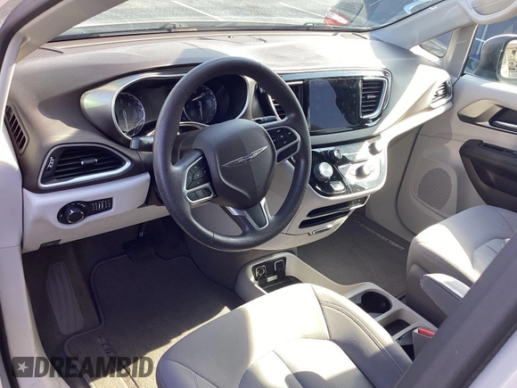 2017 Chrysler Pacifica Touring with VIN 2C4RC1DG5HR764942, listed as a IAAI auction lot 42796303 with 64,391 mi miles and . Bid and sale history available at DreamBid. Image 31.