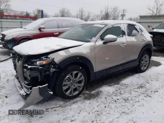 2023 Mazda CX-30 2.5 S Premium Package with VIN 3MVDMBDM7PM587088, listed as a Copart auction lot 44411775 with 15,595 mi miles and Salvage Title. Bid and sale history available at carsss.com. Image 1.
