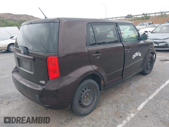 2009 Scion xB with VIN JTLKE50E291081243, listed as a IAAI auction lot 42033327 with 263,903 mi miles. Bid and sale history available at carsss.com. Image 4.