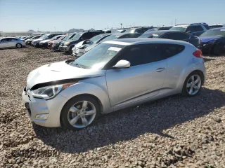 2014 Hyundai Veloster z VIN KMHTC6AD7EU216819, wystawiony jako Copart lot #57135335 z przebiegiem 104 588 mil mil oraz Szkoda całkowita • Salvage title. Historia ofert i sprzedaży dostępna na DreamBid. Obrazek 1.