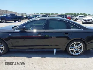 2016 Audi A6 Premium Plus with VIN WAUGFAFC0GN166596, listed as a IAAI auction lot 42526292 with 106,584 mi miles and . Bid and sale history available at DreamBid. Image 14.