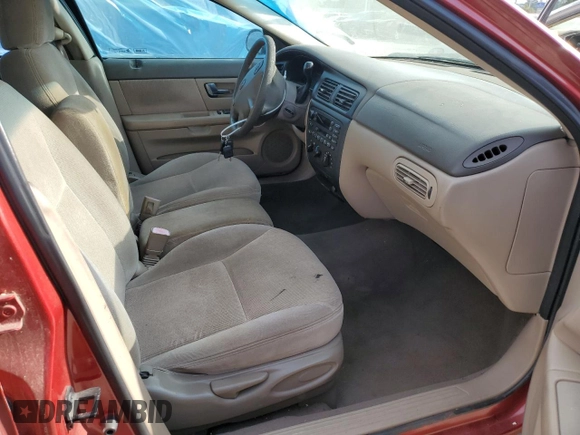 2000 Ford Taurus SES with VIN 1FAFP55U1YA262488, listed as a Copart auction lot 52312645 with 128,621 mi miles and Salvage Title. Bid and sale history available at DreamBid. Image 7.