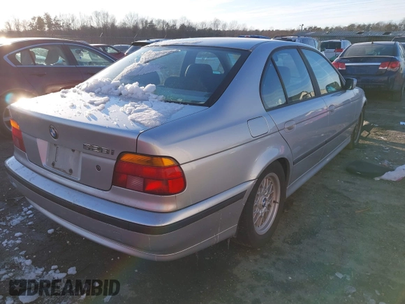 1999 BMW 5 Series 528iA with VIN WBADM6336XBY31254, listed as a IAAI auction lot 41408089 with 221,176 mi miles. Bid and sale history available at carsss.com. Image 4.
