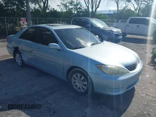 2005 Toyota Camry LE with VIN 4T1BE30KX5U589356, listed as a IAAI auction lot 42471176 with 142,153 mi miles and . Bid and sale history available at DreamBid. Image 1.