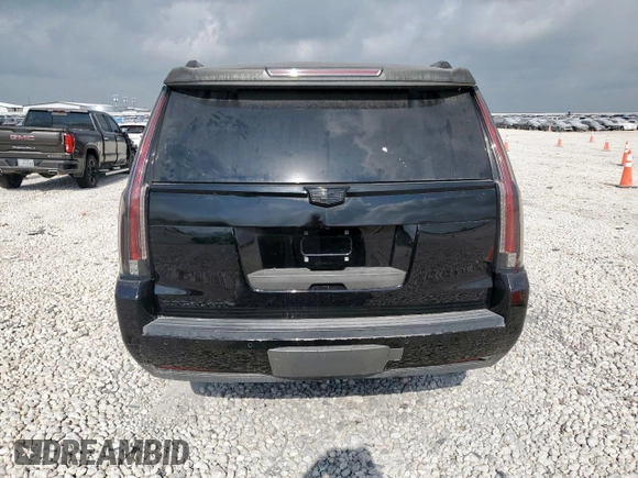 2018 Cadillac Escalade z VIN 1GYS3AKJ6JR256100, wystawiony jako Copart lot #57900755 z przebiegiem 129 775 mil mil oraz Szkoda całkowita • Salvage title. Historia ofert i sprzedaży dostępna na DreamBid. Obrazek 6.
