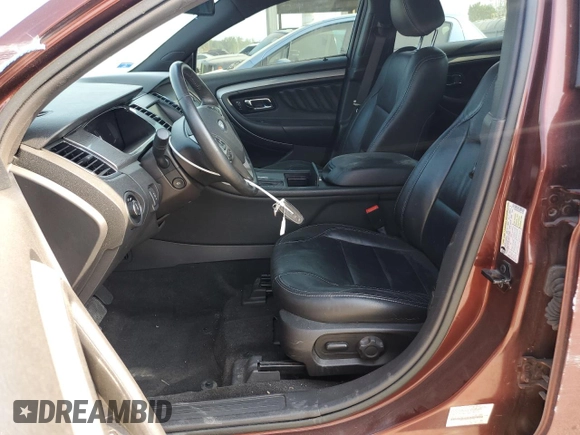 2015 Ford Taurus SEL with VIN 1FAHP2E96FG161735, listed as a Copart auction lot 61865294 with 148,070 mi miles and Salvage Title. Bid and sale history available at DreamBid. Image 7.