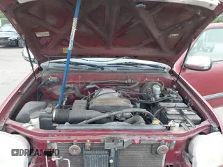 2000 Toyota Tundra SR5 z VIN 5TBRT3417YS053962, wystawiony jako IAAI lot #42051203 z przebiegiem 165 584 mil mil oraz . Historia ofert i sprzedaży dostępna na DreamBid. Obrazek 10.