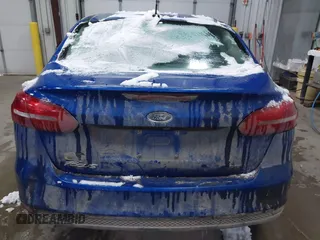 2018 Ford Focus SE z VIN 1FADP3F26JL312725, wystawiony jako IAAI lot #41488559 z przebiegiem 30 686 mil mil oraz . Historia ofert i sprzedaży dostępna na DreamBid. Obrazek 16.