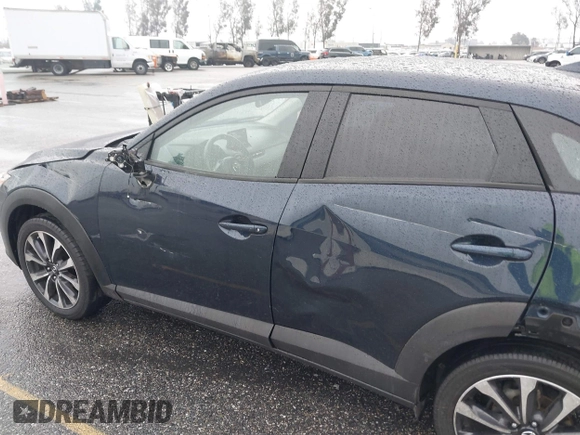 2019 Mazda CX-3 Touring with VIN JM1DKDC79K0424436, listed as a IAAI auction lot 41579280 with 76,989 mi miles. Bid and sale history available at carsss.com. Image 18.