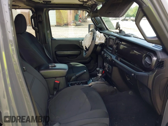 2020 Jeep Wrangler Unlimited Freedom with VIN 1C4HJXDG2LW186027, listed as a IAAI auction lot 42449664 with 87,869 mi miles and . Bid and sale history available at DreamBid. Image 5.