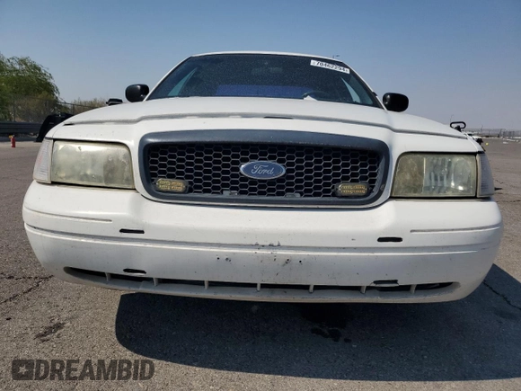 2001 Ford Crown Victoria Police Interceptor z VIN 2FAFP71W01X185449, wystawiony jako Copart lot #70462294 z przebiegiem 163 830 mil mil oraz Szkoda całkowita • Salvage title. Historia ofert i sprzedaży dostępna na DreamBid. Obrazek 5.