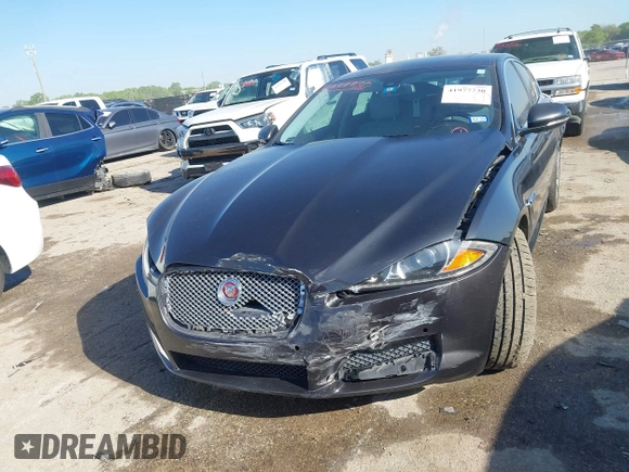 2015 Jaguar XF T Premium with VIN SAJWA0FS0FPU43248, listed as a IAAI auction lot 41977730 with 105,086 mi miles and . Bid and sale history available at DreamBid. Image 2.