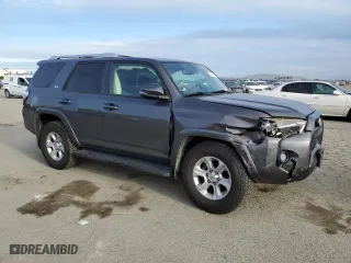 2014 Toyota 4Runner SR5 with VIN JTEZU5JR0E5073560, listed as a Copart auction lot 50196995 with 138,536 mi miles and Salvage Title. Bid and sale history available at carsss.com. Image 4.