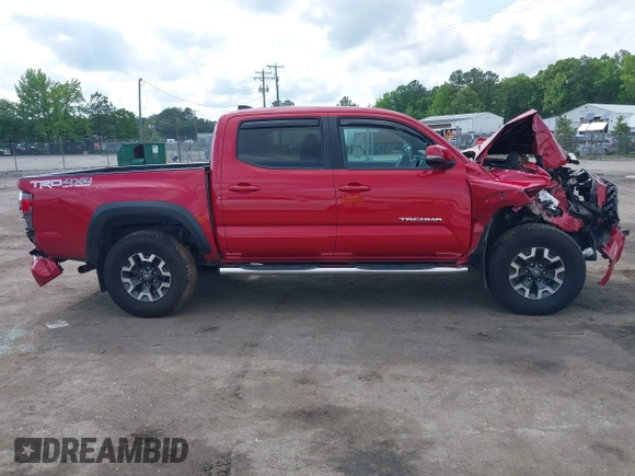 2021 Toyota Tacoma SR z VIN 5TFCZ5AN2MX263159, wystawiony jako IAAI lot #42273087 z przebiegiem 69 220 mil mil oraz . Historia ofert i sprzedaży dostępna na DreamBid. Obrazek 12.