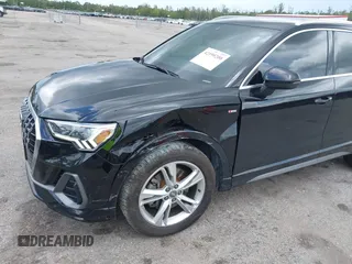 2020 Audi Q3 S line Premium Plus with VIN WA1EECF33L1052774, listed as a IAAI auction lot 42199200 with 55,008 mi miles and . Bid and sale history available at DreamBid. Image 6.