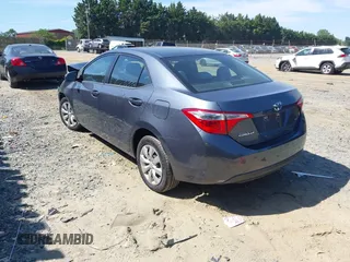 2016 Toyota Corolla L z VIN 5YFBURHE9GP526077, wystawiony jako IAAI lot #42300498 z przebiegiem 174 275 mil mil oraz . Historia ofert i sprzedaży dostępna na DreamBid. Obrazek 3.