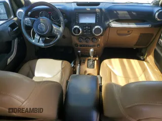 2013 Jeep Wrangler Unlimited Rubicon with VIN 1C4BJWFG0DL587057, listed as a Copart auction lot 57362535 with 102,684 mi miles and Salvage title. Bid and sale history available at DreamBid. Image 8.