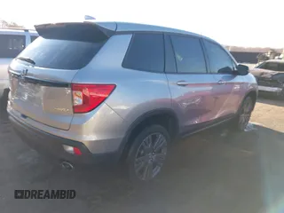 2021 Honda Passport EX-L with VIN 5FNYF8H54MB042677, listed as a IAAI auction lot 40732860 with 63,698 mi miles and . Bid and sale history available at DreamBid. Image 4.