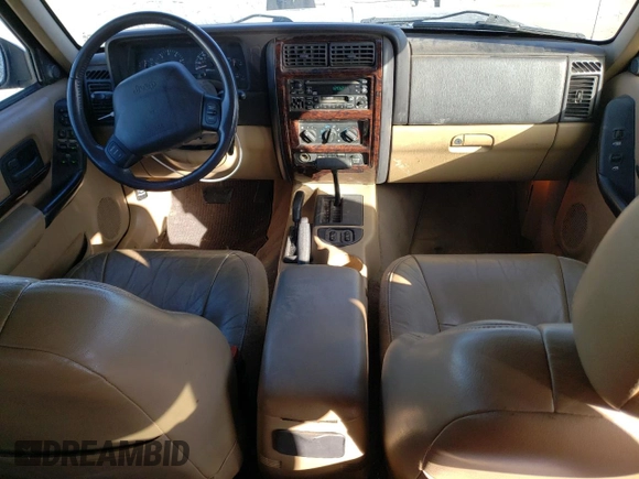 2000 Jeep Cherokee Limited with VIN 1J4FF68S0YL250926, listed as a Copart auction lot 84837244 with 141,020 mi miles and Salvage Title. Bid and sale history available at carsss.com. Image 8.