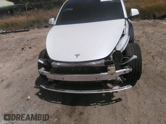 2022 Tesla Model Y Long Range z VIN 7SAYGDEE3NF385933, wystawiony jako IAAI lot #42059675 z przebiegiem 88 488 mil mil oraz . Historia ofert i sprzedaży dostępna na DreamBid. Obrazek 6.