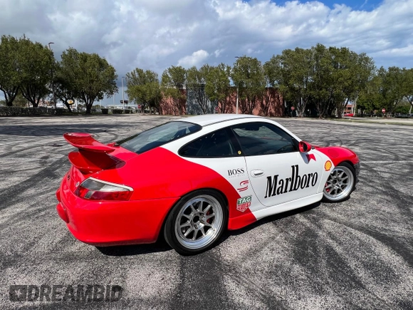 2004 Porsche 911 z VIN WP0AC299X4S692464, wystawiony jako Copart lot #50950705 z przebiegiem 44 494 mil mil oraz Czysty tytuł • Clean title. Historia ofert i sprzedaży dostępna na DreamBid. Obrazek 4.