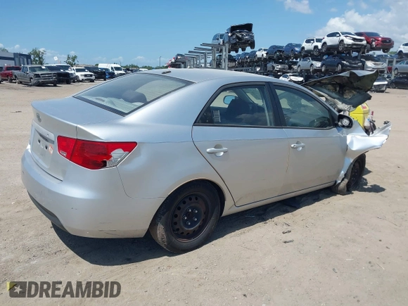 2010 Kia Forte LX with VIN KNAFT4A27A5080973, listed as a IAAI auction lot 42012776 with 244,485 mi miles. Bid and sale history available at carsss.com. Image 4.