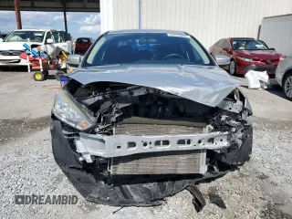 2016 Ford Focus SE z VIN 1FADP3F24GL309119, wystawiony jako Copart lot #62279095 z przebiegiem 117 535 mil mil oraz Szkoda całkowita • Salvage title. Historia ofert i sprzedaży dostępna na DreamBid. Obrazek 5.