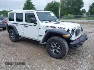 2021 Jeep Wrangler Unlimited Rubicon with VIN 1C4JJXFM9MW774142, listed as a IAAI auction lot 42625007 with 42,318 mi miles and . Bid and sale history available at DreamBid. Image 1.
