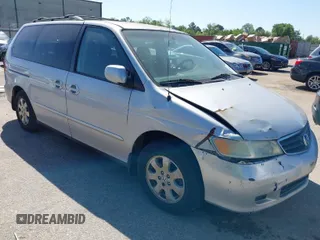 2002 Honda Odyssey EX-L z VIN 5FNRL18062B011890, wystawiony jako IAAI lot #41972294 z przebiegiem 245 889 mil mil oraz . Historia ofert i sprzedaży dostępna na DreamBid. Obrazek 1.
