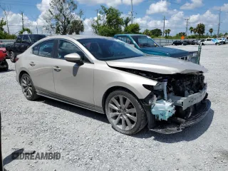 2023 Mazda 3 S Select with VIN 3MZBPABM7PM370974, listed as a Copart auction lot 61951505 with 58,845 mi miles and Salvage title. Bid and sale history available at DreamBid. Image 4.