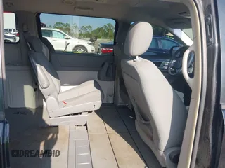 2010 Dodge Grand Caravan SXT with VIN 2D4RN5D17AR256493, listed as a IAAI auction lot 42187799 with 248,421 mi miles and . Bid and sale history available at DreamBid. Image 8.