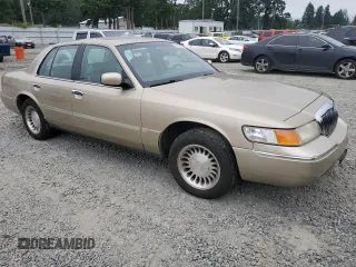 2000 Mercury Grand Marquis LS с VIN 2MEFM75W8YX672775, выставлен на аукционе Copart как лот 59609885 с пробегом 172 837 миль миль и Списание • Salvage title. История ставок и продаж доступна на DreamBid. Изображение 4.