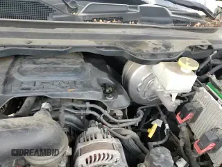 2019 Ram 1500 Tradesman z VIN 1C6SRFCT7KN560912, wystawiony jako Copart lot #70152415 z przebiegiem 119 344 mil mil oraz Szkoda całkowita • Salvage title. Historia ofert i sprzedaży dostępna na DreamBid. Obrazek 13.