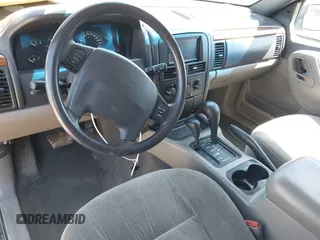1999 Jeep Grand Cherokee Laredo with VIN 1J4GW58S8XC524502, listed as a IAAI auction lot 42193506 with 147,920 mi miles and . Bid and sale history available at DreamBid. Image 18.