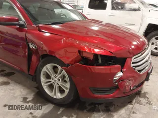 2014 Ford Taurus SEL z VIN 1FAHP2E83EG137639, wystawiony jako IAAI lot #41535259 z przebiegiem 62 978 mil mil oraz . Historia ofert i sprzedaży dostępna na DreamBid. Obrazek 6.