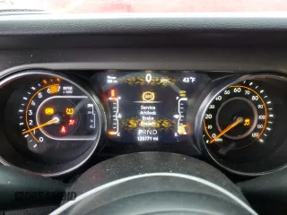 2021 Jeep Wrangler Unlimited Sport Altitude with VIN 1C4HJXDN1MW630739, listed as a Copart auction lot 87412754 with 123,771 mi miles and Salvage title. Bid and sale history available at DreamBid. Image 9.