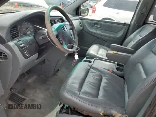 2003 Honda Odyssey EX-L with VIN 5FNRL18933B116127, listed as a Copart auction lot 56013645 with 157,118 mi miles and Salvage Title. Bid and sale history available at DreamBid. Image 7.